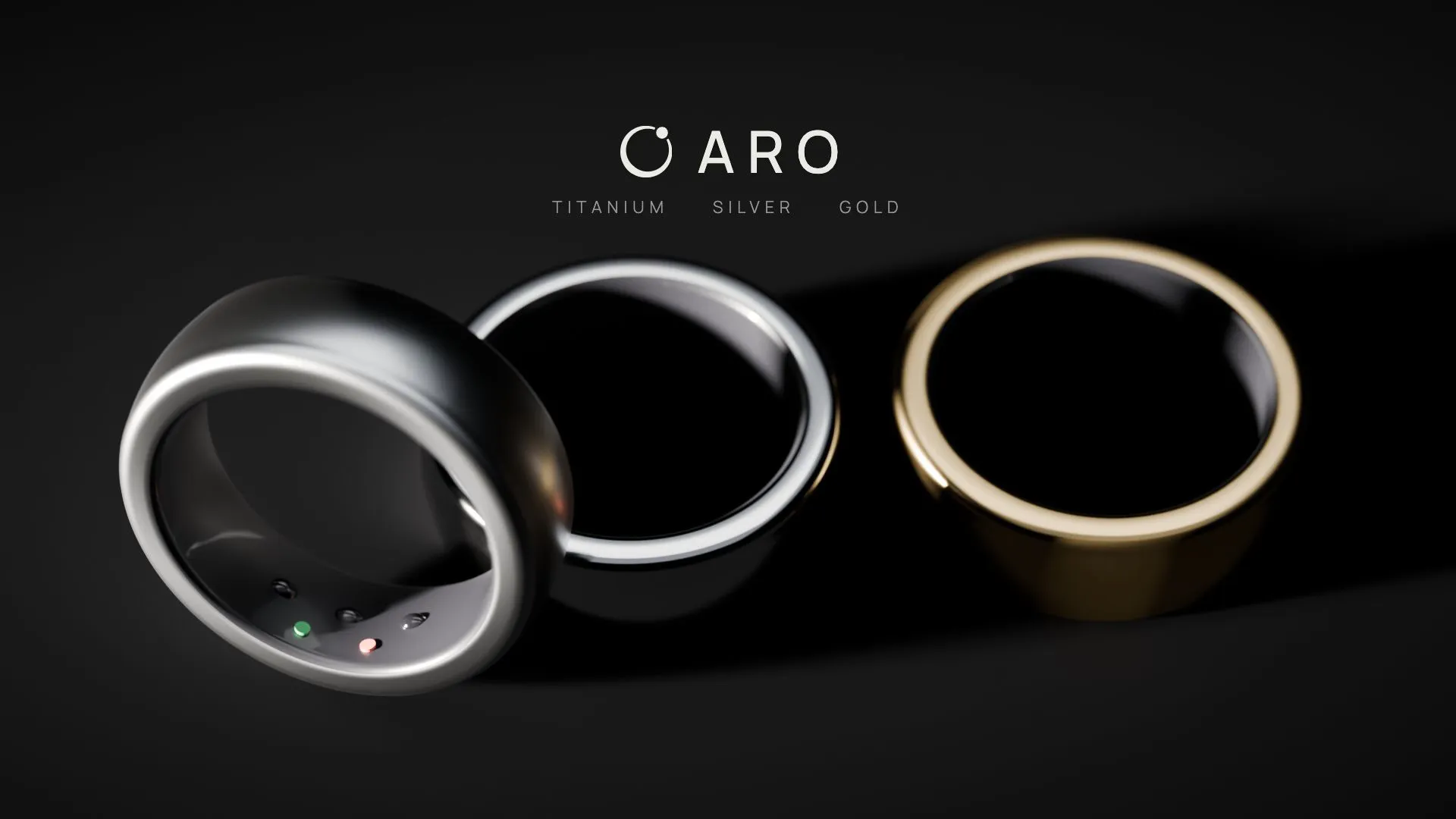The closing frame: titanium, silver, and gold rings at rest on black under the Aro lockup