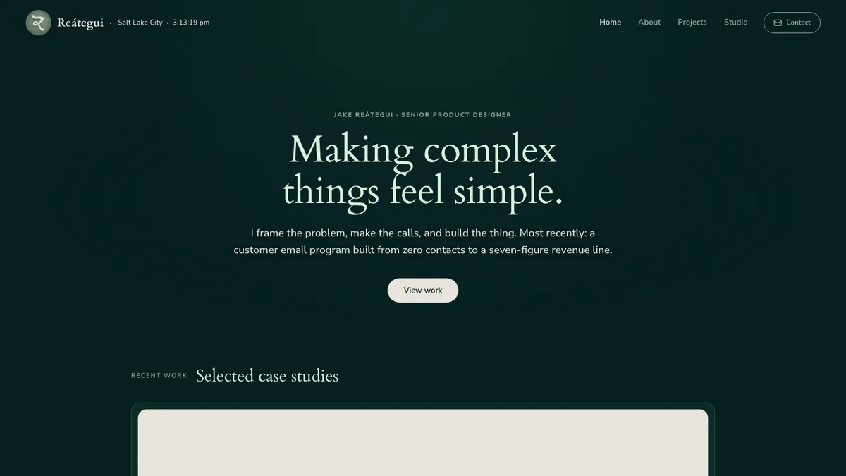 The jakereategui.com home page, dark surface with mist-sage accents.