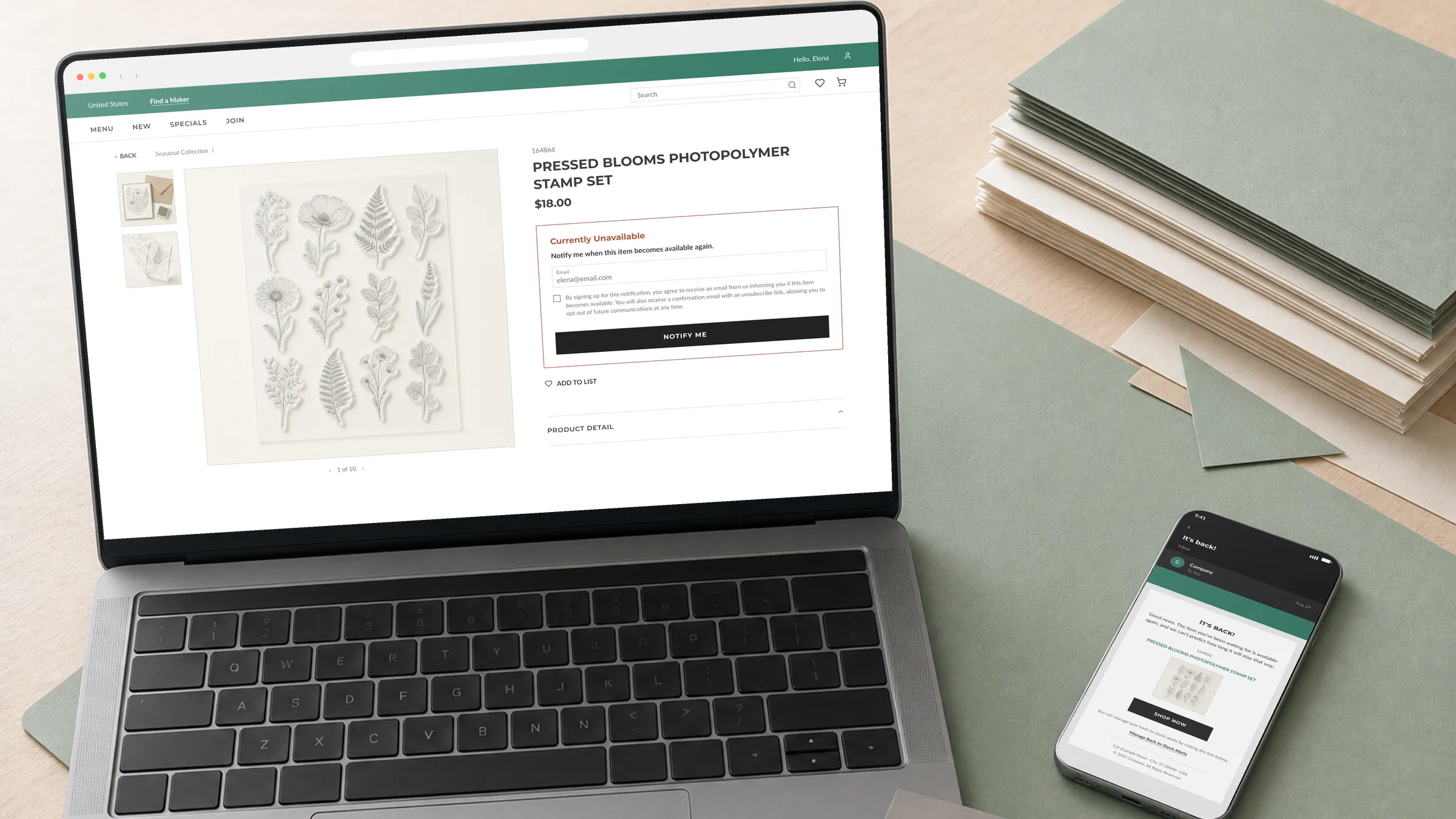 A laptop and phone on a craft bench in daylight. The laptop shows a sold-out product page with the notify-me form open; the phone shows the back-in-stock email that follows. Both screens are faithful recreations under a stand-in brand, not client assets.